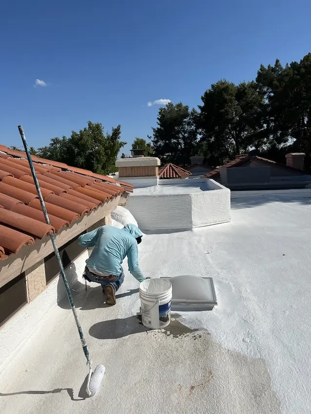 arizona flat roof company applying elastomeric coating