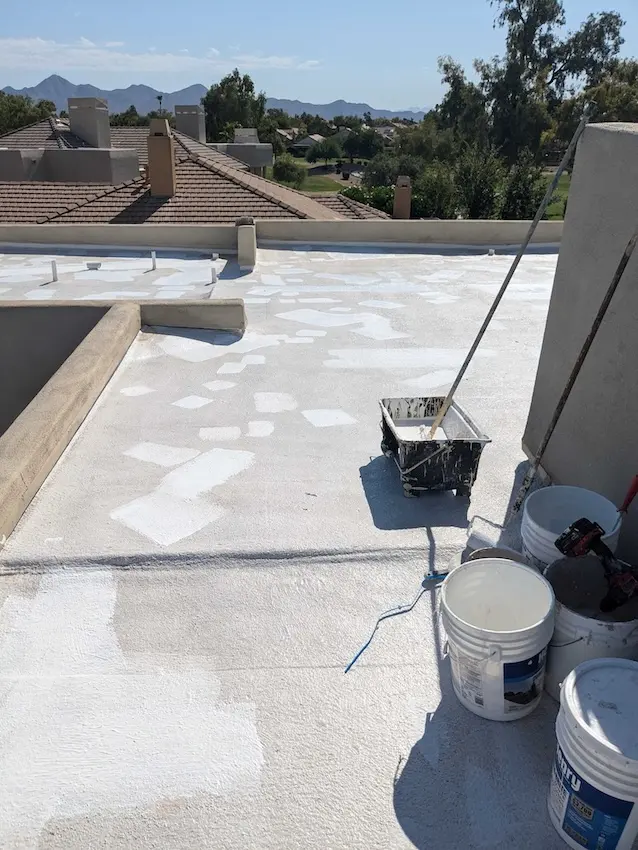 arizona flat roof company applying elastomeric coating