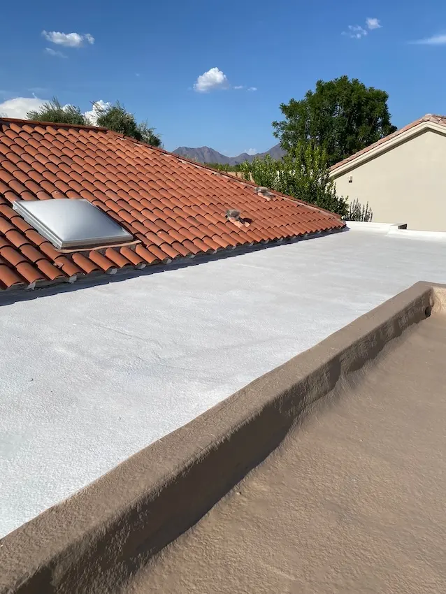 arizona flat roof company applying elastomeric coating