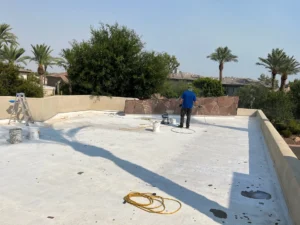 arizona flat roof company applying elastomeric coating