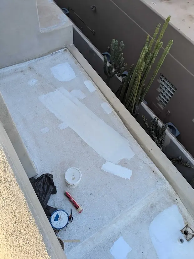arizona flat roof company applying elastomeric coating